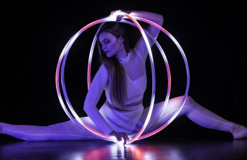 Girl with colorful pixel LED hoop by Pyroterrra Lighttoys
